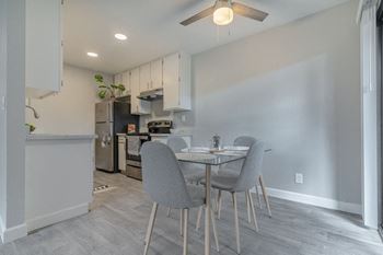 Fully equipped dining area with ceiling fan
